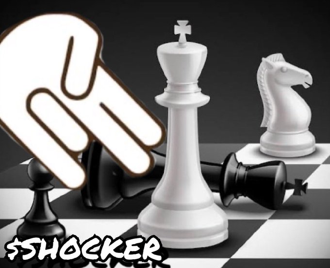 The $SHOCKER hand over a chessboard